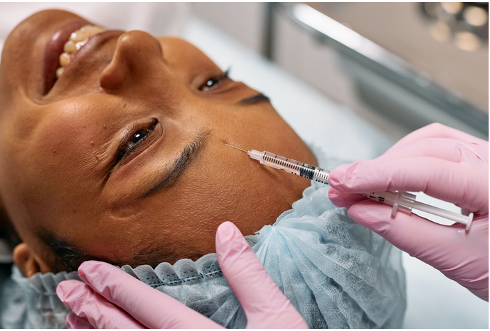 a woman undergoing a dermal filler procedure